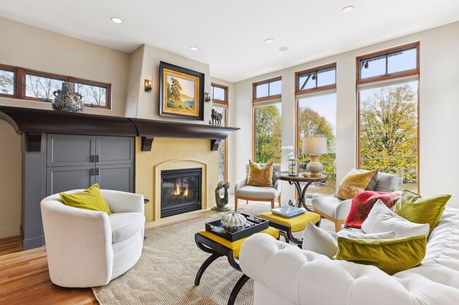 Cozy up by the elegant gas fireplace, the perfect centerpiece for warmth and ambiance - 745 Rice St E