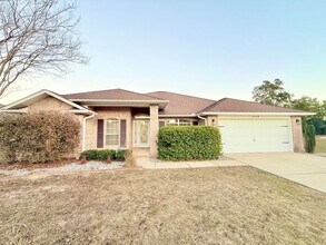 Building Photo - 5659 Tiger Woods Dr