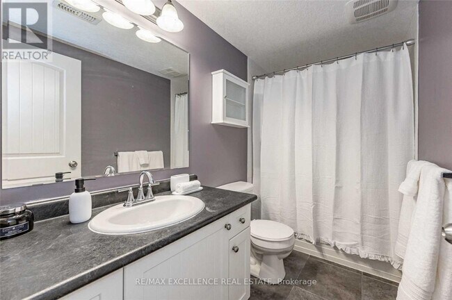 Photo du bâtiment - 1460 Highland Rd W