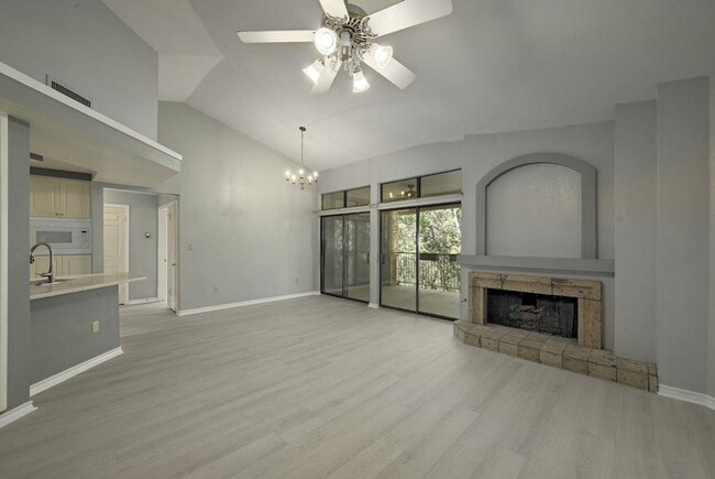 Building Photo - Luxury, Open Space Condo with Wooded Views...