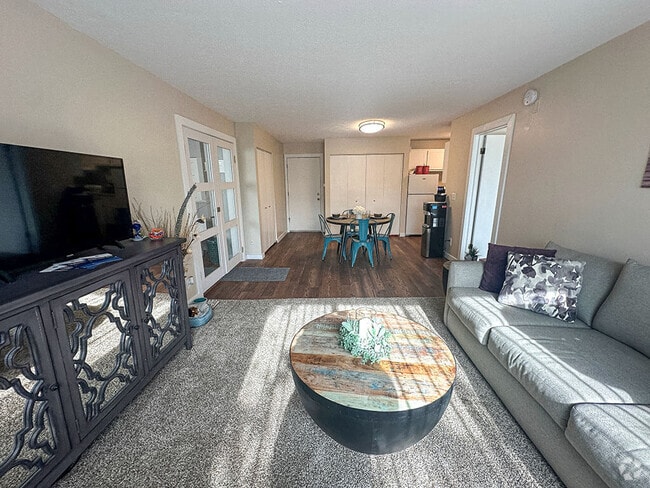 Carpeting Living Room with Natural Light - Shores of Roosevelt Park