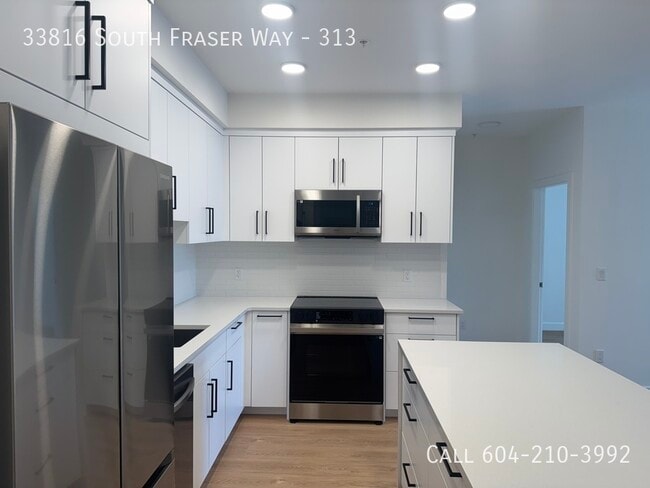 Building Photo - Brand New 2 Bed + Den Condo with Large Patio