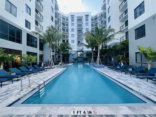 Building Photo - Studio, 1 bath Condo - 860 SE 8th St NEW A...