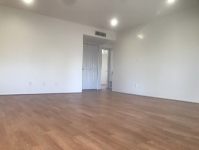bedroom w/recessed lighting & wood floors - 3640 E Montecito Ave