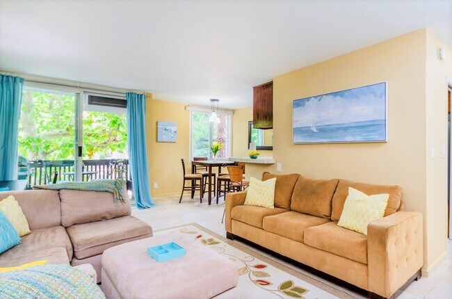 Living Room Opens to a Private Balcony - 8635 Falmouth Ave