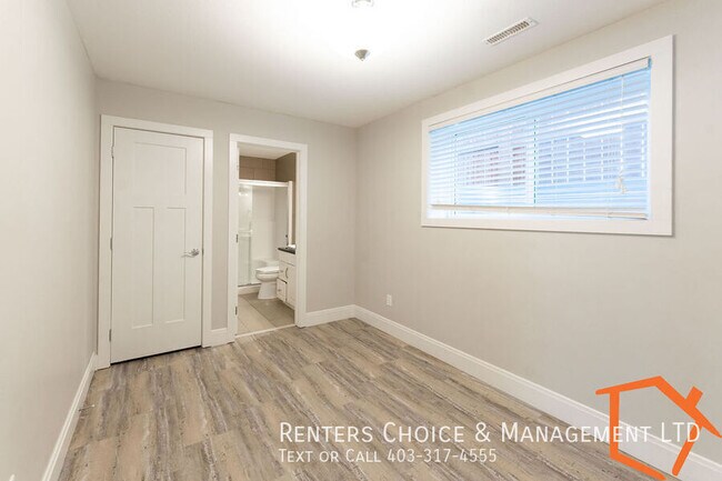 Photo du bâtiment - 2 Bedroom Basement Suite, Insuite Laundry, Assigned Parking