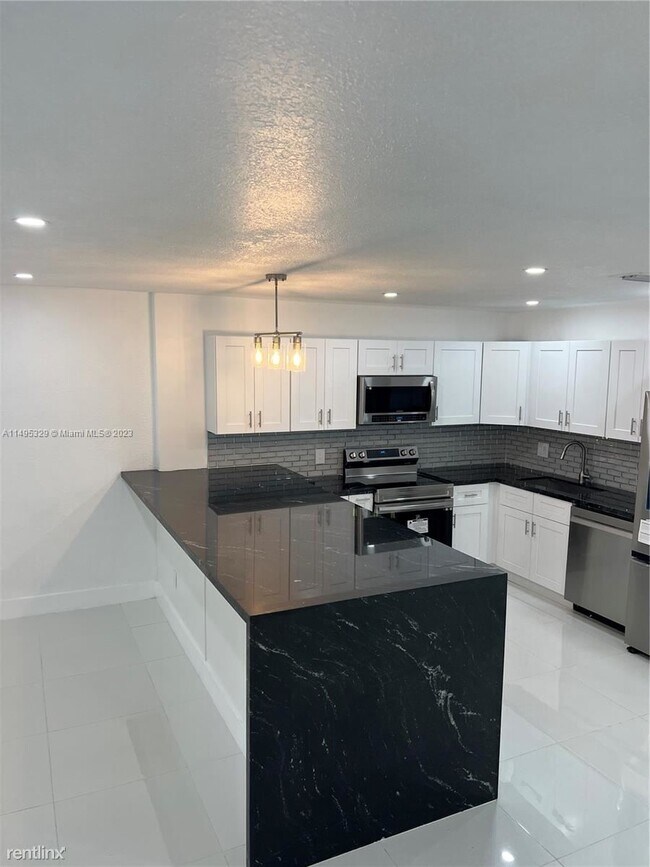 Foto del edificio - 3 br, 2 bath House - 2014 NW 60th Ave # 2014