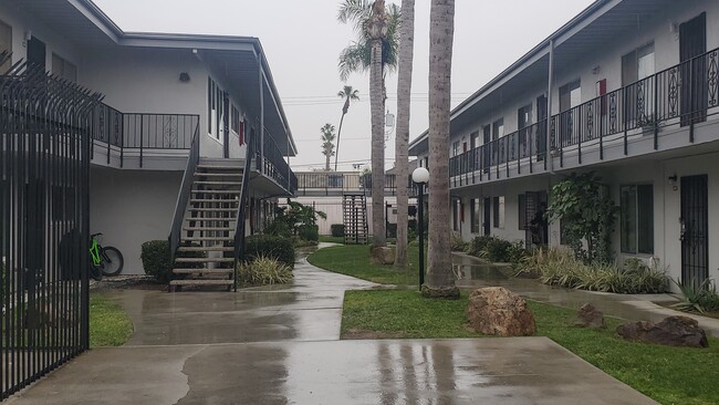 Gated community with pool and laundry - 5530 Ackerfield Ave