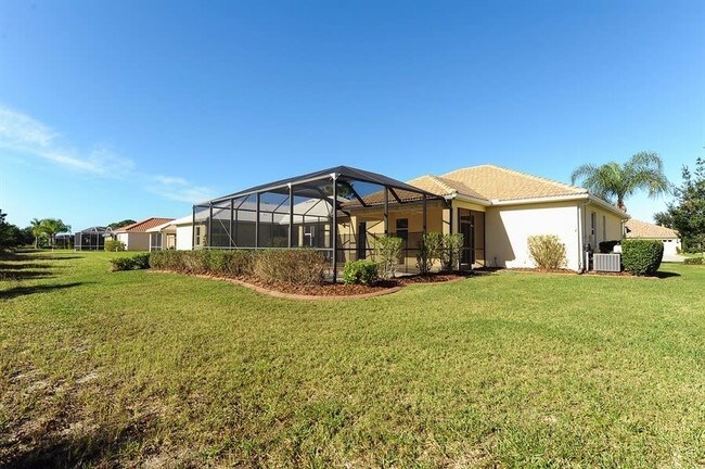 Building Photo - 1902 Coconut Palm Cir