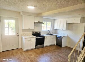 Building Photo - 7334-7336 Gigi Pl