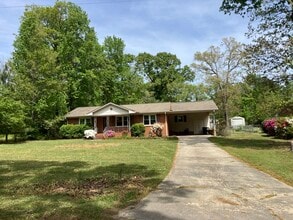 Front of house showing 2 car carport - 3608 Red Bud St