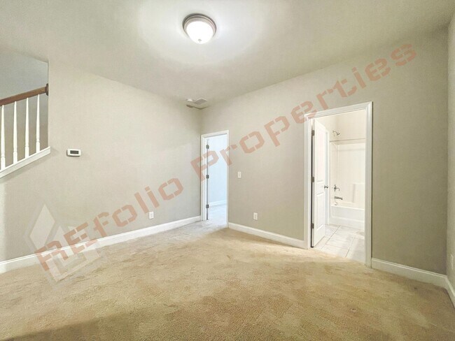 Building Photo - Great Location! 3 Story Townhome with 2 Be...