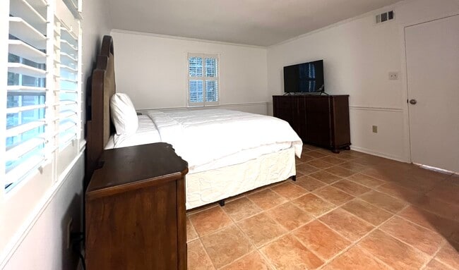 Bedroom another view of bedroom one one with a king bed - 902 Penn Waller Rd