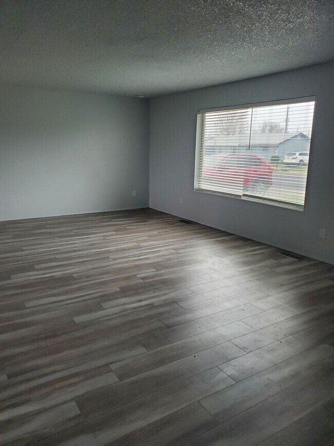 Building Photo - House with Garage & Fenced Yard