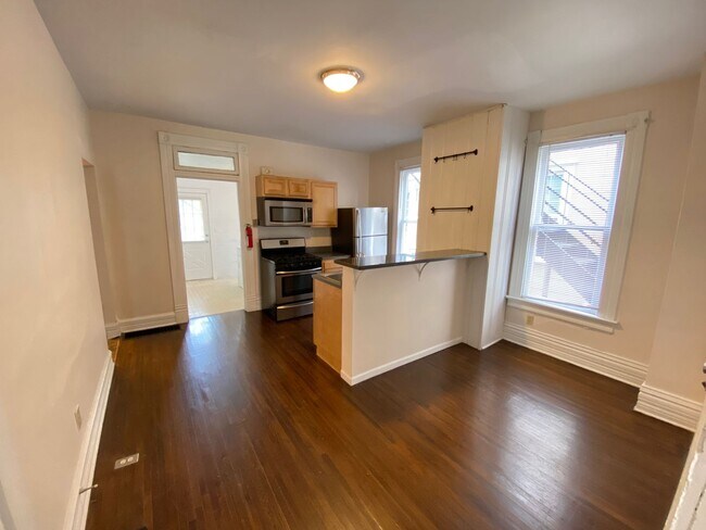 Building Photo - 106-108 W Tompkins St