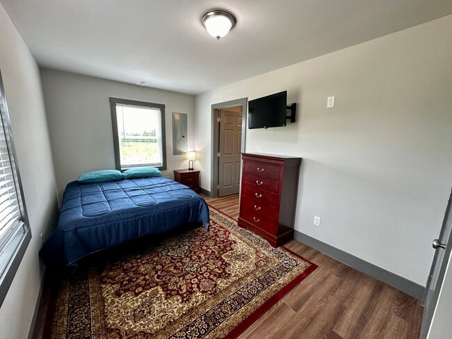 Building Photo - New Construction-Fully Furnished & Utiliti...