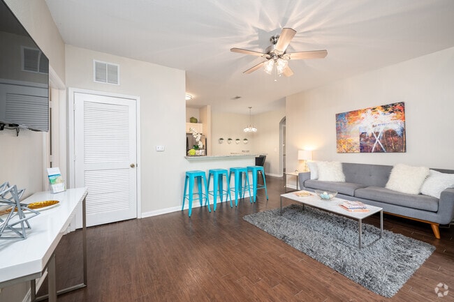 2HAB, 2BA Sala de estar - Waters Edge Apartments