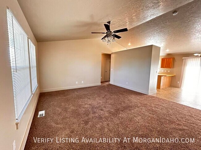 Building Photo - 2-car garage in convenient location w/ pat...