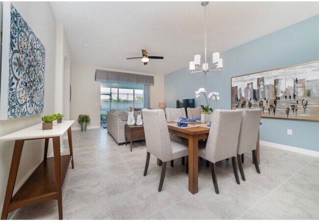 Foto del edificio - BEAUTIFUL CHAMPIONS GATE 2 BED 2 BATH COND0  w/GARAGE - FULLY FURNISHED - 12 MONTH RENTAL