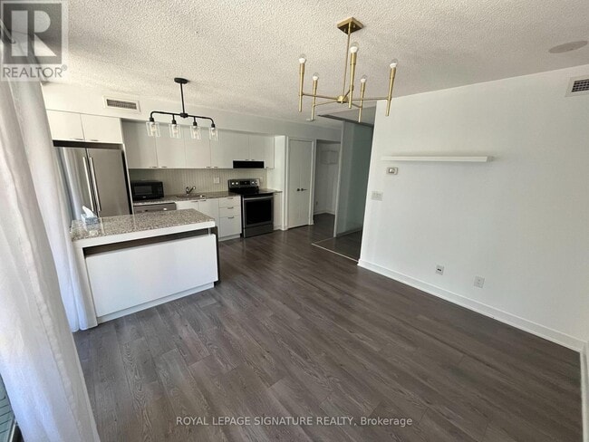 Photo du bâtiment - 110 Charles St E