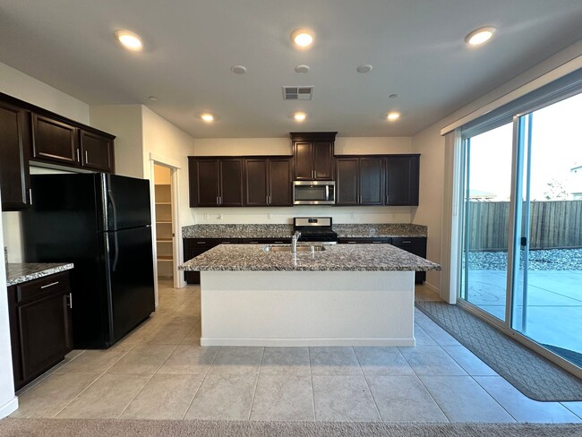 Building Photo - Stunning 3 Bedroom in Gated Community with...