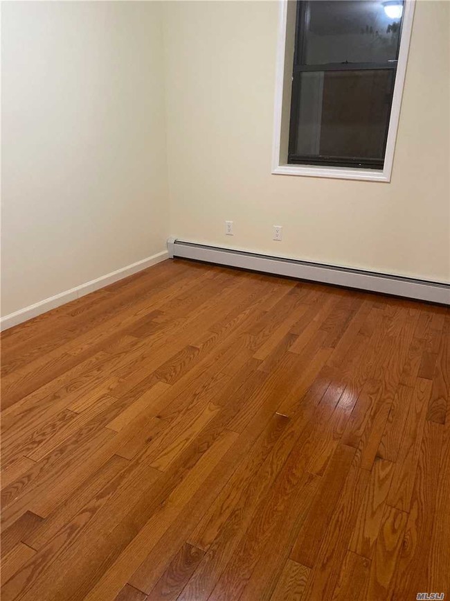 Building Photo - 126-05-126-18 18th Ave