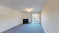 Located at 3700 Hermitage Dr in Voorhees, NJ, this single-floor, 3-bedroom, 2-bathroom home offers a well-organized and comfortable layout. The living room serves as the heart of the home, featuring a classic fireplace with a white mantel, plush carpeting, a ceiling fan, and sliding glass doors that open to a private balcony with outdoor views. The open sightlines from the entryway through to the living area create a sense of spaciousness throughout.

The kitchen is well-appointed with rich dark cabinetry, granite-style countertops, hardwood-style flooring, and a full suite of stainless steel appliances including a gas range, microwave, dishwasher, and ample cabinet and pantry storage. An adjacent dining room completes the main living area.

The generously sized primary bedroom features multiple windows that flood the room with natural light, ceiling fan, and carpeted flooring. Additional bedrooms are equally bright with large windows and plush carpet. The home includes six closets throughout, offering exceptional storage.

Both bathrooms are clean and functional — one features a walk-in shower with sliding glass doors and accessibility grab bars, while the second includes a tub-shower combination with similar accessibility features and light wood-style flooring.