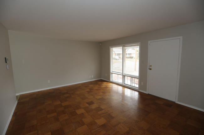 Building Photo - Two-bedroom, one-bathroom home