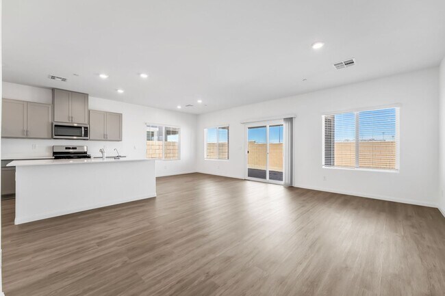 Building Photo - Modern Cadence Living with Designer Finishes & Open-Concept Style!