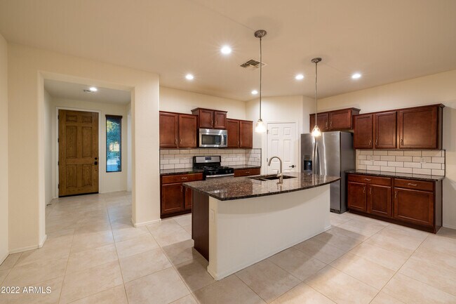 Building Photo - 10747 W Lariat Ln