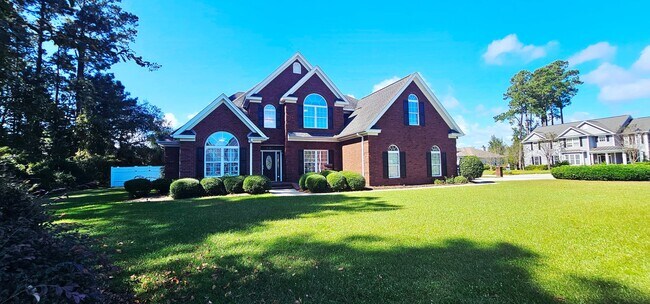 Building Photo - “Elegant 5-Bed Executive Home with Pool – ...