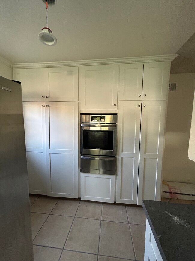 Contains oven and Pantry Cabinets - 11690 Kismet Ave