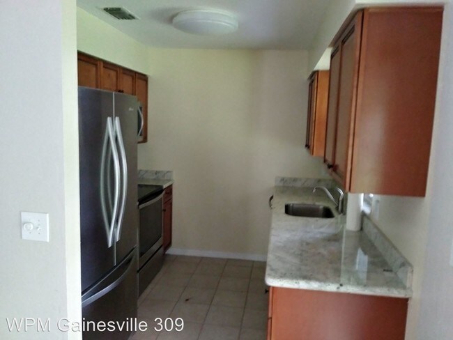 Building Photo - 4 br, 2 bath House - 8203 SW 12th Pl