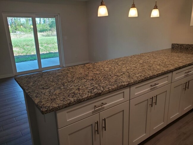 Building Photo - 3x2 Duplex Unit