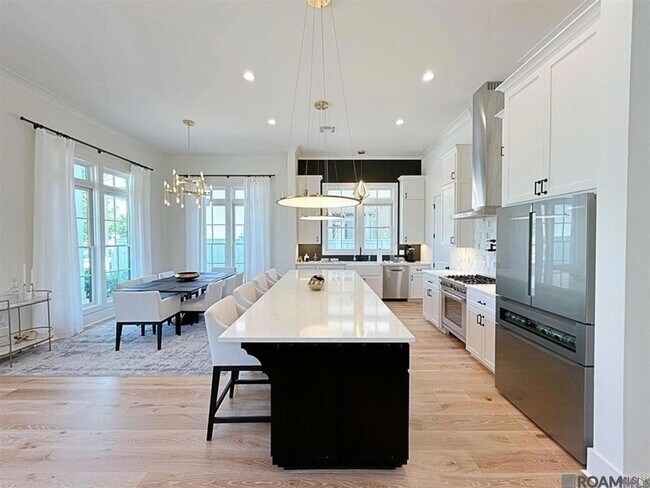 Foto del edificio - 3118 Pointe-Marie Dr