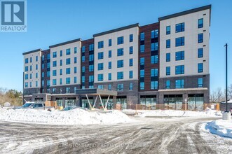 Building Photo - 203-555 BONACCORD St