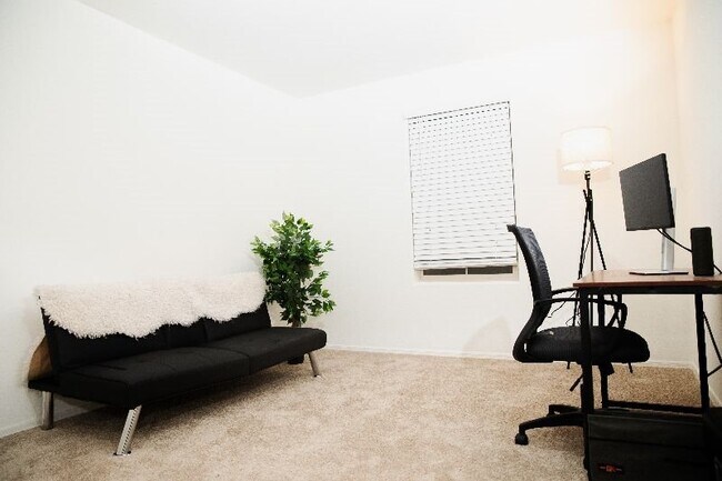 Den - 12445 W Belmont Ave