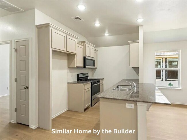 Building Photo - Brand-New 2 Bed / 2 Bath Duplex with Garage & Fenced Yard