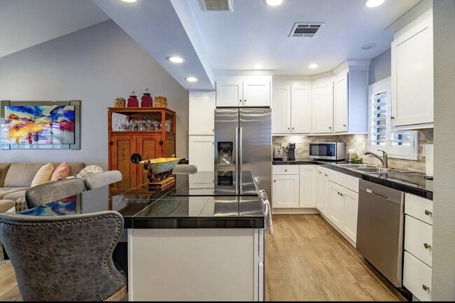 Building Photo - Completely remodeled and updated condo loc...