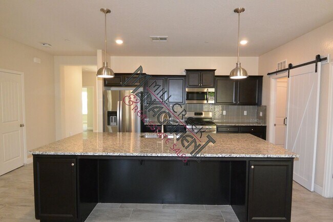 Building Photo - Stunning newer home in North West Visalia ...