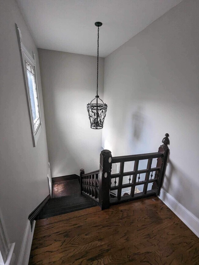 Stairs from foyer to livingroom - 1003-2 Broadway St