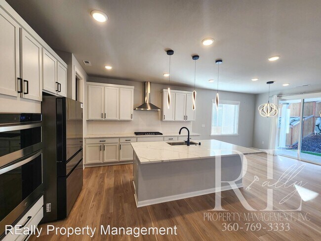 Foto del edificio - 4 br, 3 bath House - 4623 Hibiscus Cir SW