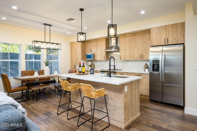 Building Photo - Exclusive Urban Sanctuary—Sophisticated Townhouse in Vibrant Phoenix
