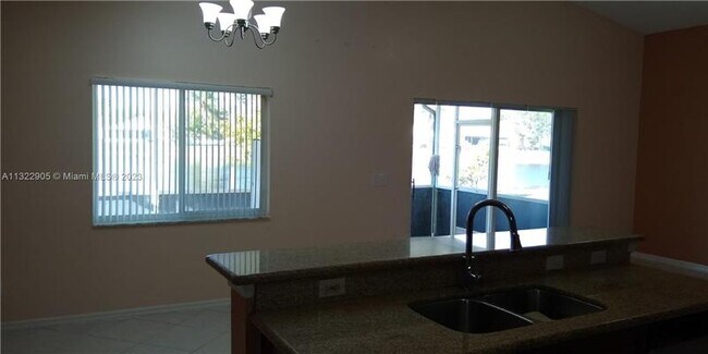 Building Photo - 10541 SW 24th Ct