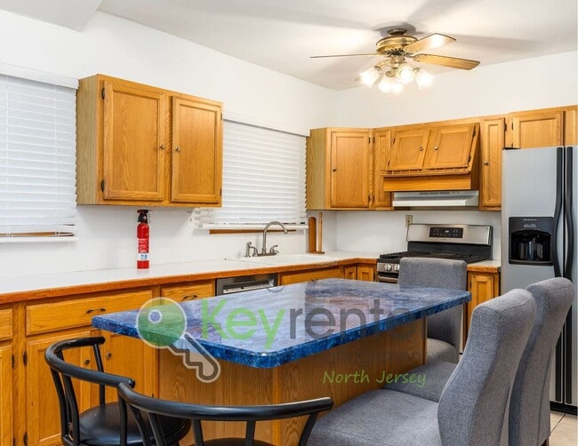 Photo - Spacious 2BR / 2.5BA Home with Huge Deck, Private Yard & Parking for 6