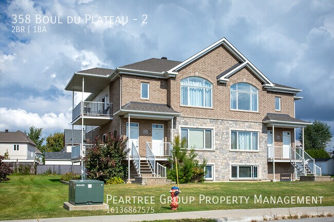 Building Photo - Luxury Apartment-Great Location in Gatinea...