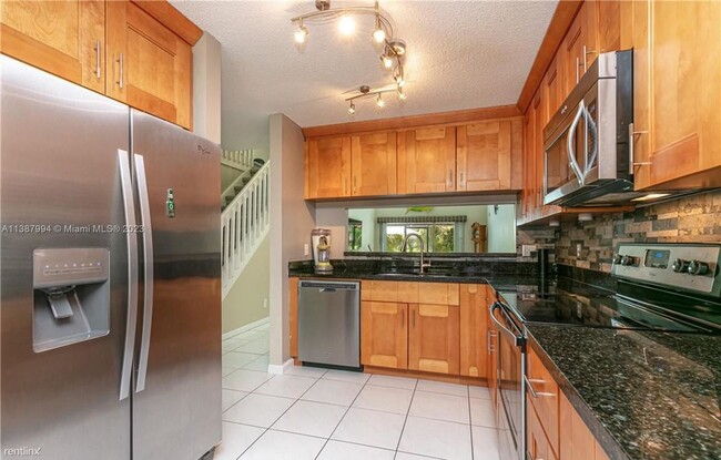 Building Photo - 3 br, 2.5 bath House - 7610 Pinewalk Dr S ...