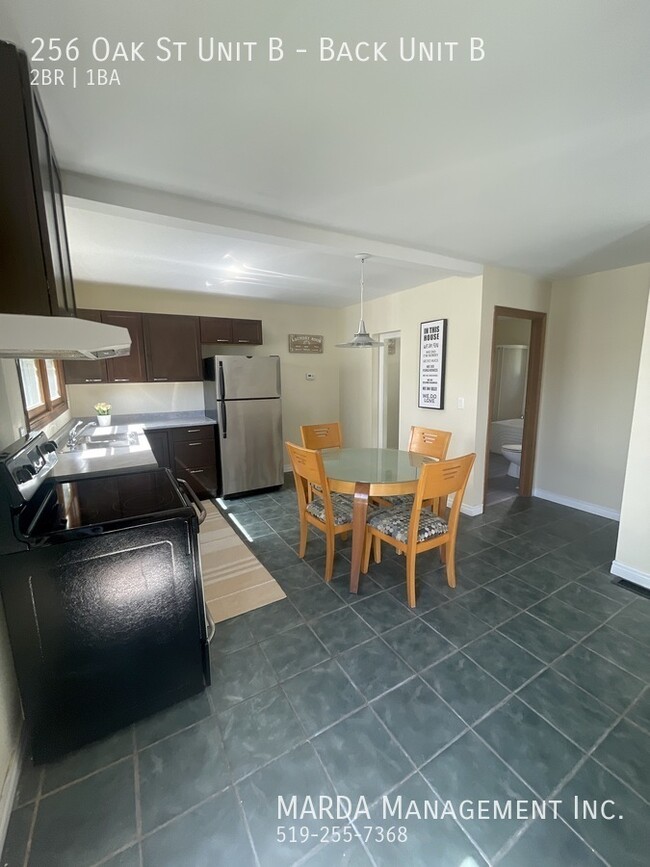 Photo du bâtiment - SPACIOUS 2-BEDROOM/1BATH REAR UNIT - ALL I...