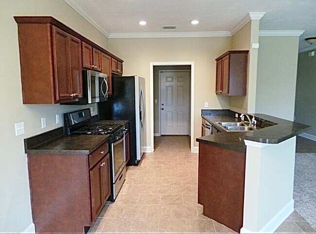 Foto del edificio - 4 BR/ 2 BA with 1 car garage home located in Villas at Pine Forest