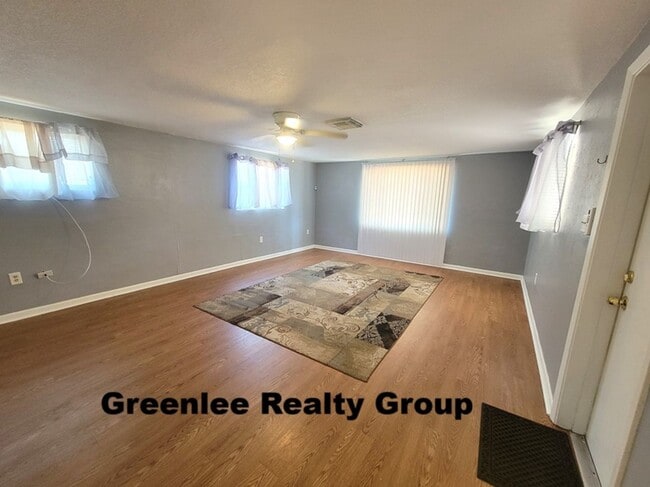 Building Photo - Cozy 2 Bed/1 Bath Duplex Apt with a Carport and Large Fenced Back Yard!